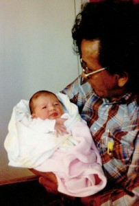 Roland and his newborn, 1990